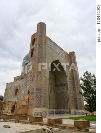 Entrance portal of Bibi Khanum mosque decorated with mosaics of XV century in Samarkand, Uzbekistan Entrance portal of Bibi Khanum mosque decorated with mosaics of XV century in Samarkand, Uzbekistan 118422308