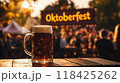 woman with beer. inscription "Oktoberfest" 118425262