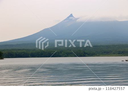 Mt. Komagatake, an active volcano between Mori town, Shikabe Town and Nanae towns on the Oshima peninsula in southwest Hokkaido as viewed from Onuma pond in the Oshima Park, near Hakodate 118427557