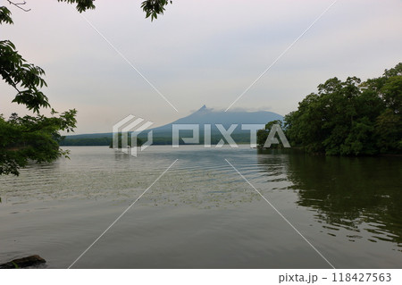 Mt. Komagatake, an active volcano between Mori town, Shikabe Town and Nanae towns on the Oshima peninsula in southwest Hokkaido as viewed from Onuma pond in the Oshima Park, near Hakodate 118427563