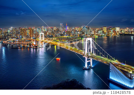 Aerial view of Tokyo cityscape and rainbow bridge at night, Japan. 118428578