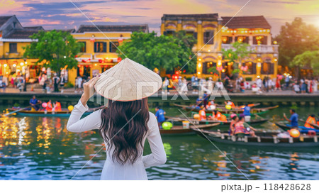 Asian woman wearing vietnam culture traditional at Hoi An ancient town,Hoi an city in Vietnam. 118428628