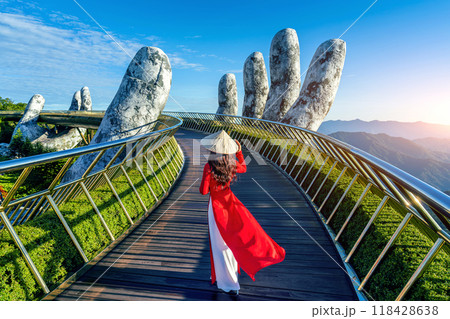 Tourist walking at Golden bridge in Bana hills, Da nang, Vietnam. Tourist walking at Golden bridge in Bana hills, Da nang, Vietnam. 118428638