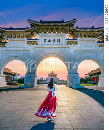 Asian woman walking in Archway of Chiang Kai Shek Asian woman walking in Archway of Chiang Kai Shek 118428660