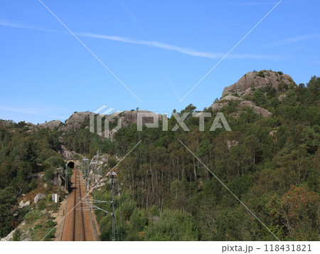 Fun park like landscape on the Gamle jaerbanen Veien, hiking route along the old railway trasse, Egersund, Norway. 118431821
