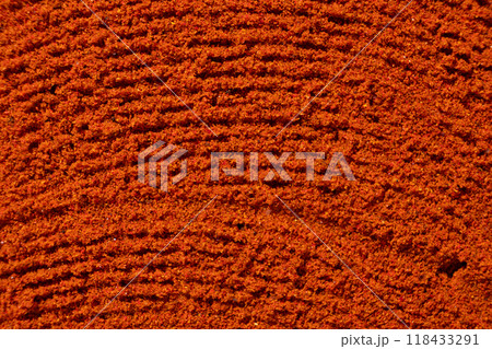 Ground paprika, red terracotta spice background, art in cooking. 118433291