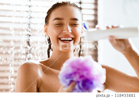 Taking Shower. Young Girl Putting Shower Gel On Puff 118433881