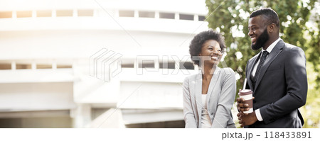 Cheerful african couple of professionals enjoying coffee break together, panorama with copy space 118433891