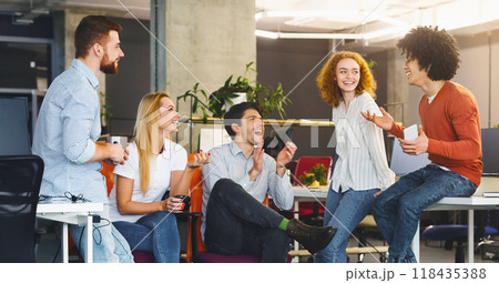 Friendship at workplace. Diverse millennial people having good talk at coworking space, panorama 118435388