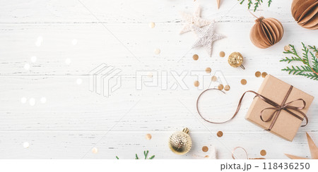 Festive Christmas background with gift box and Christmas decorations 118436250