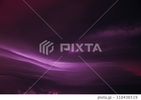 Purple violet magenta Cloudy Sky With Dark Storm Clouds During Rain. Natural Background With Rainclouds. natural weather background dark violet backdrop thunderstorm stormy sky Purple violet magenta Cloudy Sky With Dark Storm Clouds During Rain. Natural Background With Rainclouds. natural weather background dark violet backdrop thunderstorm stormy sky 118436519