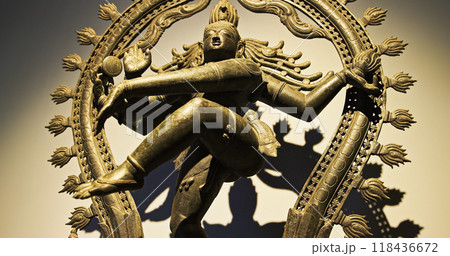 Close-up View on Statue Of Shiva Nataraja: Cosmic Dance Of Shiva One Of Main Deities In Hinduism, As Divine Cosmic Dancer. His Dance Is Called Tandava. Lord Shiva Here Appears As A Cosmic Dancer 118436672