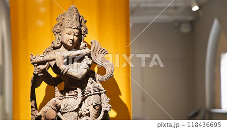 Statue Of Krishna Playing Flute. Krishnas Love Songs Are Both Shravya And Drishya -heard And Seen-. He Is God Of Protection, Compassion, Tenderness, And Love. Krishna Is Major Deity In Hinduism 118436695