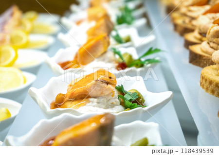 Babaganoush with fish and pickled cucumber, beautifully served in a restaurant Babaganoush with fish and pickled cucumber, beautifully served in a restaurant 118439539