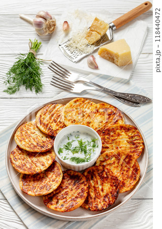 baked cottage cheese parmesan pancakes on plate baked cottage cheese parmesan pancakes on plate 118440472