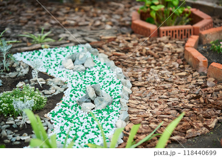 Flower bed border design at beautiful home garden Flower bed border design at beautiful home garden 118440699