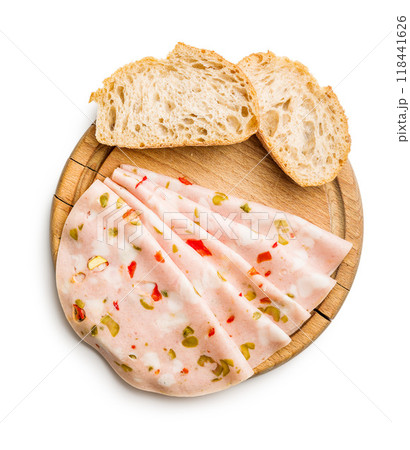 Slices of Sausage Mortadella isolated on white background. Slices of Sausage Mortadella isolated on white background. 118441626