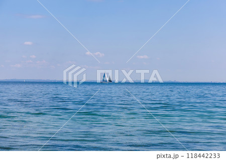 Blue sea and sailing boats on a sunny day 118442233
