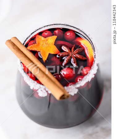 Christmas drink - red spiced mulled wine in glass Christmas drink - red spiced mulled wine in glass 118442343