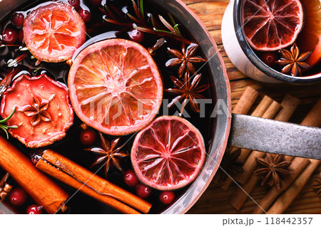 Close up of copper pot with red mulled wine Close up of copper pot with red mulled wine 118442357