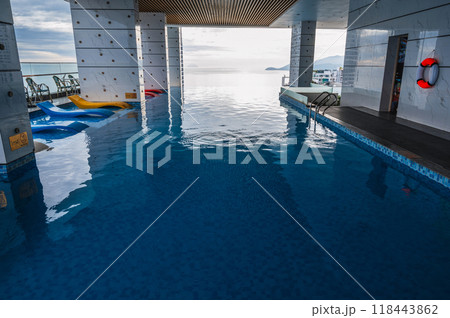 interior of luxury skyscraper hotel with a rooftop pool overlooking the sea interior of luxury skyscraper hotel with a rooftop pool overlooking the sea 118443862