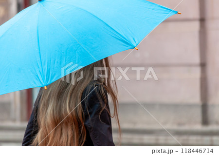 Woman walking on the street Woman walking on the street 118446714