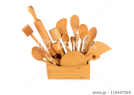 Set of wooden kitchen utensils isolated on white. Set of wooden kitchen utensils isolated on white. 118447569