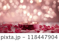 A sleek circular podium surrounded by scattered rose petals against a soft, glowing pink background, perfect for beauty or romantic-themed displays 118447904