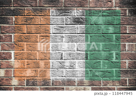 An Ivory Coast Cote DIvoire flag on an old brick wall An Ivory Coast Cote DIvoire flag on an old brick wall 118447945