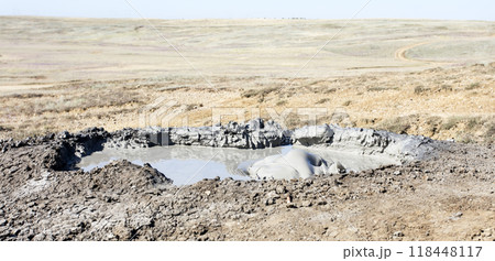 photo of a mud volcano eruption, landscape photography 118448117