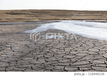 photo of a mud volcano eruption, landscape photography 118448130