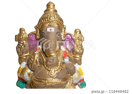 Ganesha idol made of painted clay on white background. Ganesha idol made of painted clay on white background. 118448482