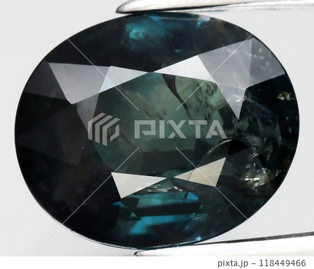 Exquisite Close-Up of a Faceted Dark Green Gemstone Showcasing Intricate Clarity and Intense Color Depth Exquisite Close-Up of a Faceted Dark Green Gemstone Showcasing Intricate Clarity and Intense Color Depth 118449466