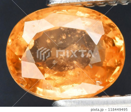 Exquisite Close-Up of a Sparkling Orange Faceted Gemstone Exquisite Close-Up of a Sparkling Orange Faceted Gemstone 118449495