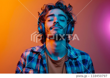 Man Enjoying Music in Vivid Neon Lights Man Enjoying Music in Vivid Neon Lights 118450797