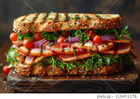 Gourmet Turkey Sandwich on Wooden Table 118451179