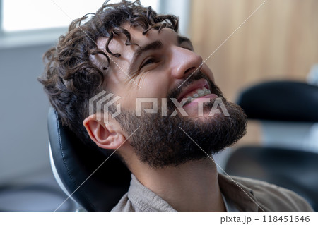 Male patient visiting doctor for dental treatment examining teeth and oral hygiene Male patient visiting doctor for dental treatment examining teeth and oral hygiene 118451646