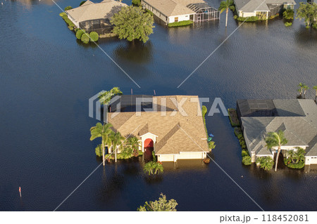 Flooded residential area with underwater houses and cars from hurricane Debby rainfall water in Laurel Meadows community in Sarasota, Florida. Aftermath of natural disaster in southern USA 118452081