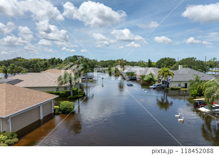 Flooding in Florida caused by tropical storm from hurricane Debby. Suburb houses in Laurel Meadows residential community surrounded by flood waters in Sarasota. Aftermath of natural disaster Flooding in Florida caused by tropical storm from hurricane Debby. Suburb houses in Laurel Meadows residential community surrounded by flood waters in Sarasota. Aftermath of natural disaster 118452088