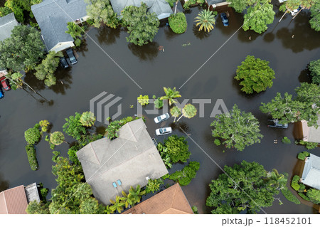 Hurricane Debby tropical rainstorm flooded residential homes and cars in suburban community in Sarasota, Florida. Aftermath of natural disaster Hurricane Debby tropical rainstorm flooded residential homes and cars in suburban community in Sarasota, Florida. Aftermath of natural disaster 118452101