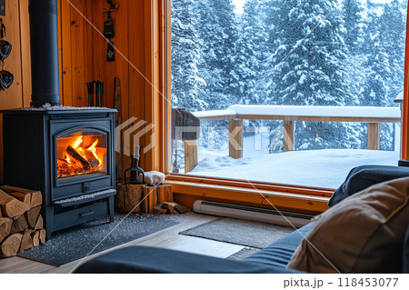 窓から雪景色の見える、薪ストーブのあるおしゃれなリビング6　AI生成画像 118453077