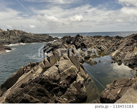 Near the Father Sidotti Landing Monument in Yakushima JAPAN, there is a beach where you can enjoy the magnificent terrain, geological formations and huge rocks. Near the Father Sidotti Landing Monument in Yakushima JAPAN, there is a beach where you can enjoy the magnificent terrain, geological formations and huge rocks. 118453183