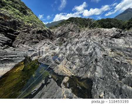 Near the Father Sidotti Landing Monument in Yakushima JAPAN, there is a beach where you can enjoy the magnificent terrain, geological formations and huge rocks. 118453193