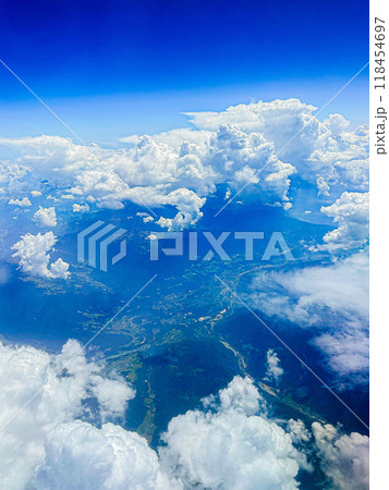 Blue sky with clouds, beautiful view from the window an airplane Blue sky with clouds, beautiful view from the window an airplane 118454697