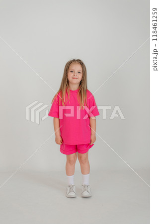 Little cute child kid baby girl 4-5 years old wearing in pink clothes isolated on wall background, children studio portrait. Mother's Day, love family, parenthood childhood concept 118461259