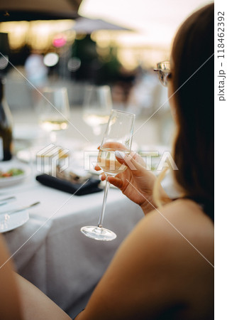 Wine tasting. Sommelier pours wine into a glass Wine tasting. Sommelier pours wine into a glass 118462392