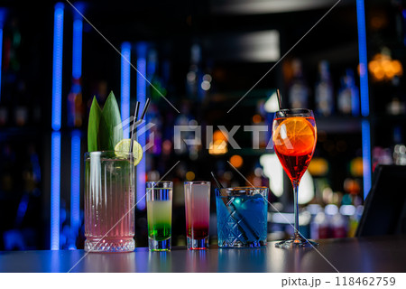 Cocktails set on a bar at Casino. Cocktails assortment. 118462759