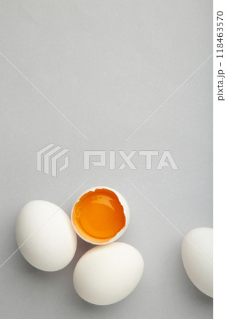 White eggs and egg yolk on the grey background. Easter concept 118463570