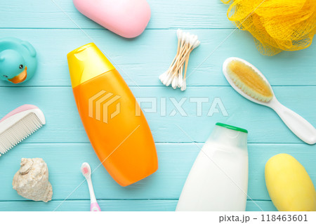 Toiletries baby on blue background. Baby shower gel. 118463601