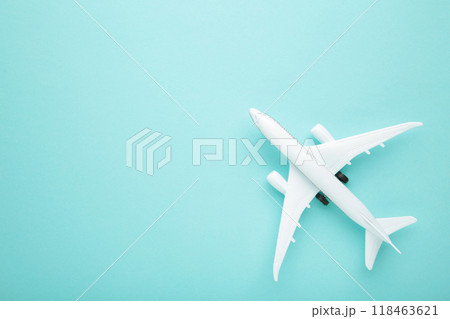 Model airplane on blue pastel color background. 118463621